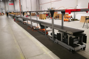 Sorting line with slide open gate passages